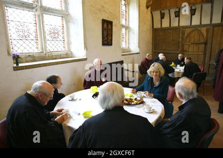 Camilla, Duchess of Cornwall takes tea with the Brothers during a visit to the Hospital of St Cross and Almshouse of Noble Poverty in Winchester. Stock Photo