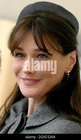 France's First Lady Carla Bruni-Sarkozy watches the ceremonial welcome in Windsor at the beginning of the two-day official state visit. Stock Photo