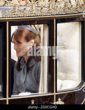 France's First Lady Carla Bruni-Sarkozy rides in a carriage to Windsor Castle at the beginning of the two-day official state visit Stock Photo