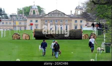 Mike Tindall (right) walks with his girlfriend Zara Phillips (2nd left) and her father Mark Phillips (centre) during the opening day of the Badminton Horse Trials in Badminton, England. Stock Photo