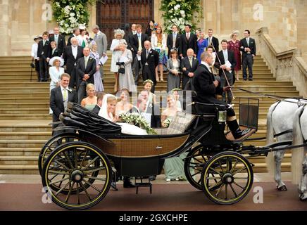 Peter Phillips and Autumn Kelly leave St. George's Chapel by horse drawn carriage after their marriage ceremony at Windor Castle, Windsor. Stock Photo