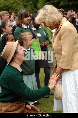 Camilla, Duchess of Cornwall meets elderly women who have tended the 'Dig for Victory' organic allotment in St James' Park, London, England. The Duchess of Cornwall was celebrating her 61st Birthday. Stock Photo