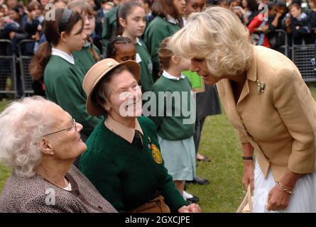 Camilla, Duchess of Cornwall meets elderly women who have tended the 'Dig for Victory' organic allotment in St James' Park, London, England. The Duchess of Cornwall was celebrating her 61st Birthday. Stock Photo