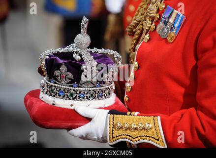 The Imperial State Crown arrives at Westminster for Queen Elizabeth ll to wear at the State Opening of Parliament in central London. Stock Photo