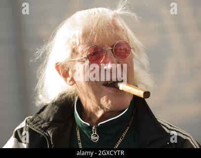 Sir Jimmy Savile attends the ceremony to name Cunard's new cruise-liner Queen Elizabeth II in Southampton Docks in Southampton, England. Stock Photo