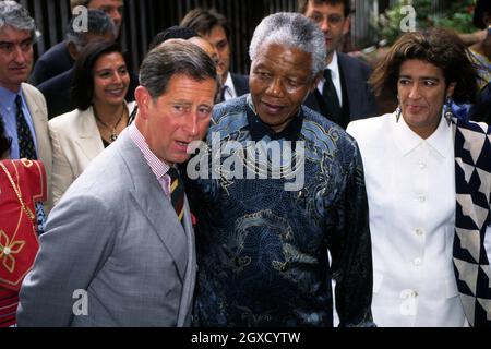 Charles, Prince of Wales accompanies the President of South Africa Nelson Mandela as he walks through Brixton during his Official Visit to Britain. Stock Photo