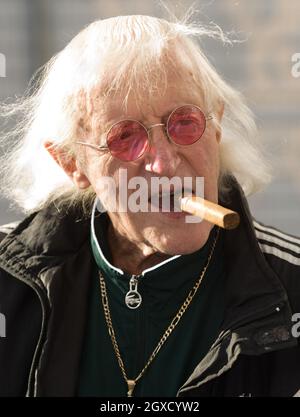 Sir Jimmy Savile attends the ceremony to name Cunard's new cruise-liner Queen Elizabeth II in Southampton Docks in Southampton, England. Stock Photo