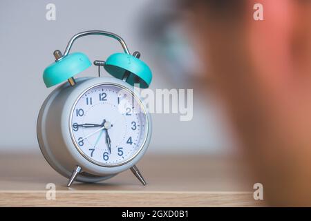 Retro styled white alarm clock Stock Photo