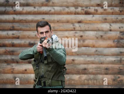 angry terrorist militant guerrilla soldier warrior in forest Stock Photo