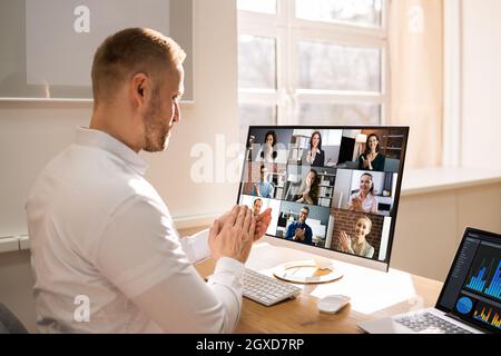 Virtual Conference Meeting Interview In Office Clapping Stock Photo