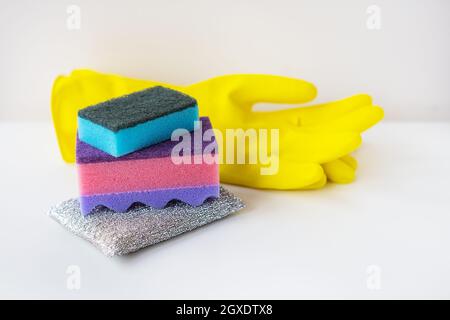 Preparation for cleaning the house, washcloths, rubber gloves, scraper. Cleanliness and cleaning concept Stock Photo
