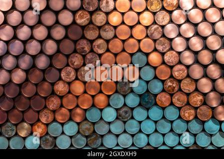 Creative textured background of scenography of various colorful metal plates placed in even rows Stock Photo