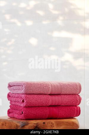 Folded pink towels Stock Photo