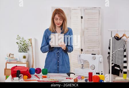 Seamstress woman in workshop Stock Photo