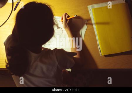 Girl studying and doing homework in italy 2021. High quality photo Stock Photo