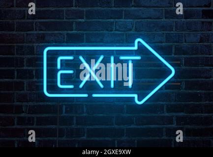 Exit neon sign on brick wall Stock Photo