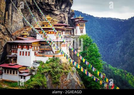 Paro Taktsang, also known as the Taktsang Palphug Monastery and the Tiger's Nest is a sacred Vajrayana Himalayan Buddhist site located in the cliffsid Stock Photo