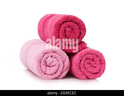 Rolled towels on white background Stock Photo