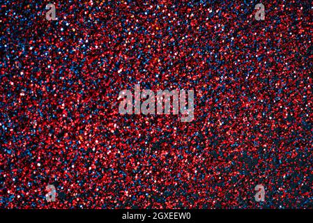 Neon shiny glitter texture background purple and blue. Luxury glow surface gradient backdrop. Color glistering dust. Stock Photo