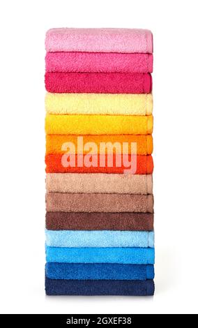 Folded stack of towels on white background Stock Photo