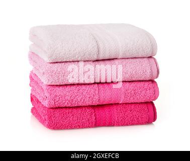 Pink towels stack on white background Stock Photo