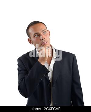 Businessman reflects on what decision to take Stock Photo
