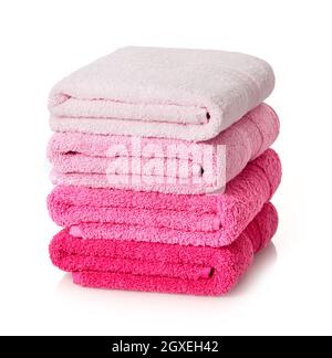 Pink towels stack on white background Stock Photo