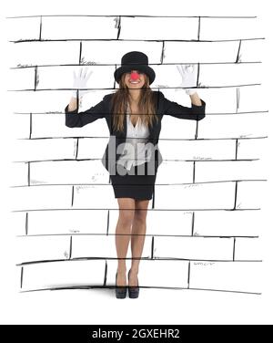 Businesswoman plays to mime imagining a wall Stock Photo