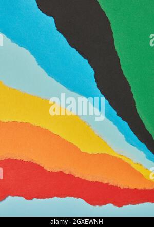 Multi-colored torn paper background Stock Photo
