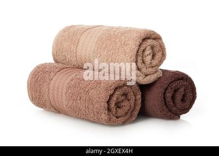 Rolled towels on white background Stock Photo