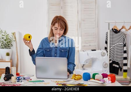 Seamstress woman in workshop Stock Photo
