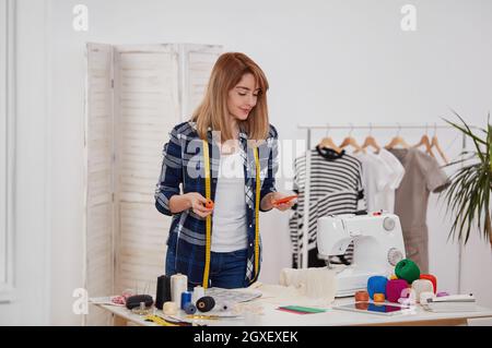 Seamstress woman in workshop Stock Photo