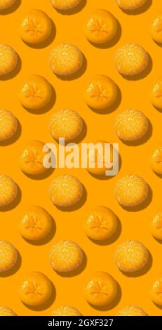 Seamless food pattern with orange fruits. From above. Minimal flat lay concept. Stock Photo