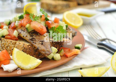 a naturally cooked fish recipes Stock Photo