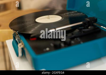 vintage record player. old vinyl record on table Stock Photo
