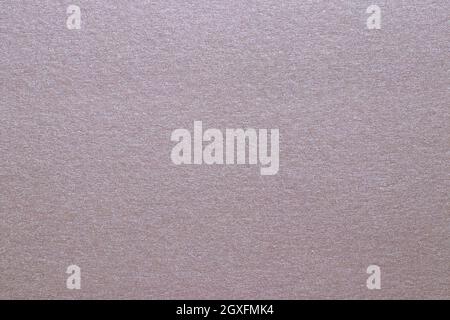Closeup of a bright seamless red brown glitter sparkling metal paper texture for christmas gift design, Web, card with shiny surface and copy space fo Stock Photo