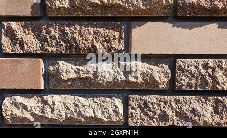 Wall and floor masonry. Various stone textures. Multicolored background. Selective focus. Stock Photo