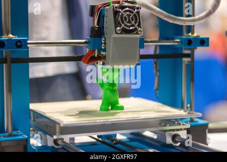 Automatic 3d printer performs a three-dimensional product creation, close-up Stock Photo