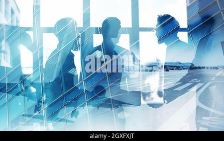 Take off of a modern aircraft with double exposure of airport Stock Photo