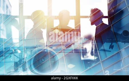 Take off of a modern aircraft with double exposure of airport Stock Photo