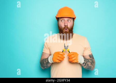 Incompetent worker is unsure about his work Stock Photo