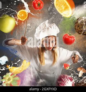 Chef with angry expression with food background Stock Photo