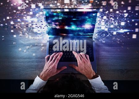 Businessman works with laptop and Futuristic lights on screen. Global internet connection and streaming concept Stock Photo