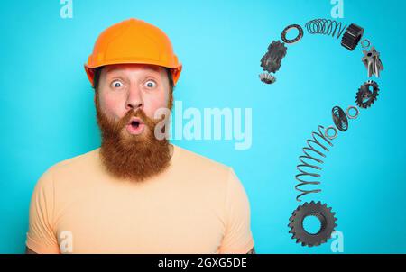 Incompetent worker is unsure about his work and has doubts Stock Photo