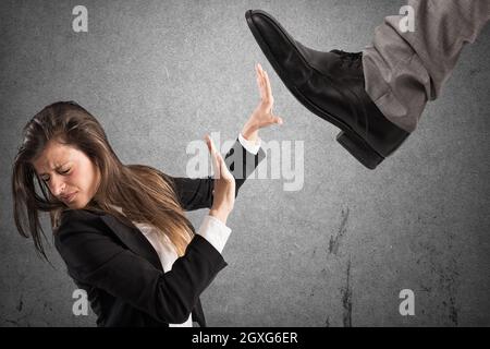 Aggressive boss against his scared employee. Mobbing concept Stock Photo