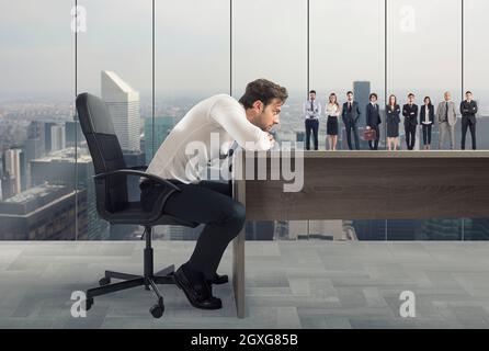 Boss selects suitable candidates to the workplace. Concept of recruitment and work team Stock Photo