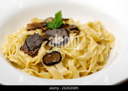 black truffle on home made pasta Stock Photo