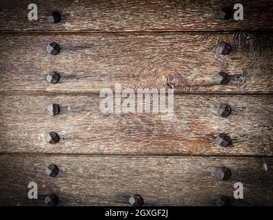 The Old boards and metal rivets. Backgrounds and textures Stock Photo