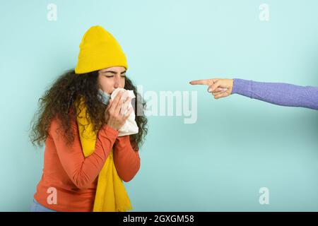 Girl caught a cold and someone give her a mask. Stock Photo