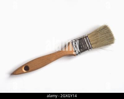 Paint brush of size 30 mm over white Stock Photo